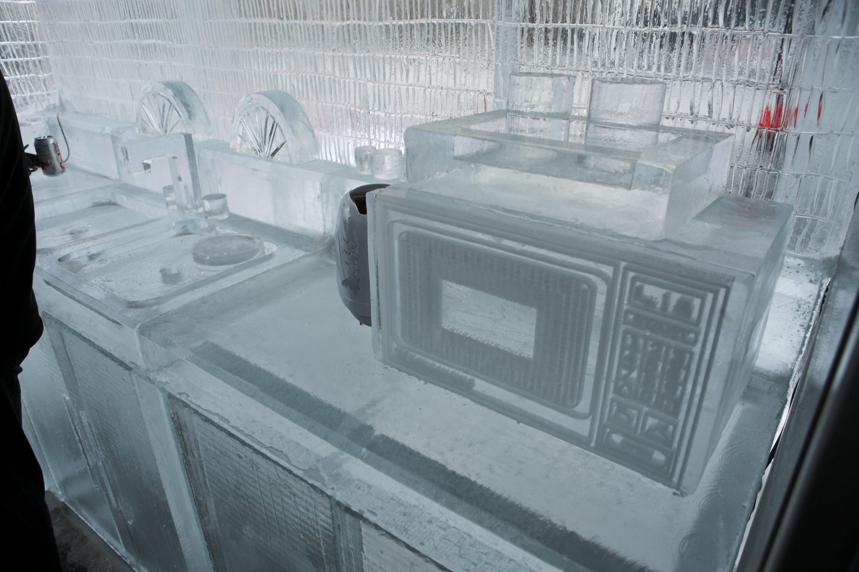 Kitchen made out of ice with detailed microwave